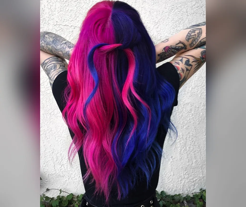 Split magenta and royal blue waves in vivid halloween hair color ideas