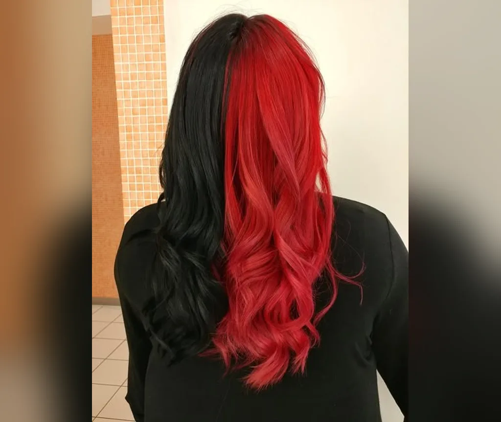 Split black and red waves, a dramatic halloween hair color idea