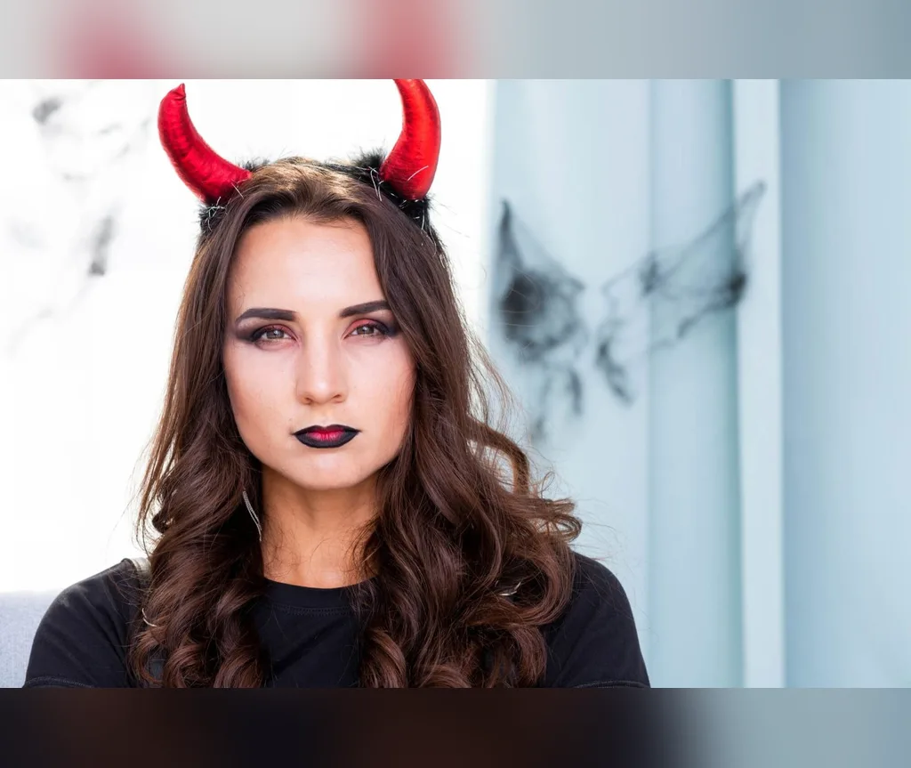 Red devil horns with glossy brown waves for a quick last-minute Halloween look