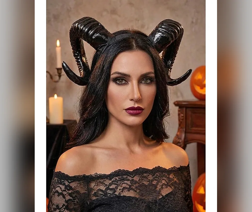 Big black ram horns with dark wavy hair, fierce halloween hairstyles for women for demon and dark fairy looks