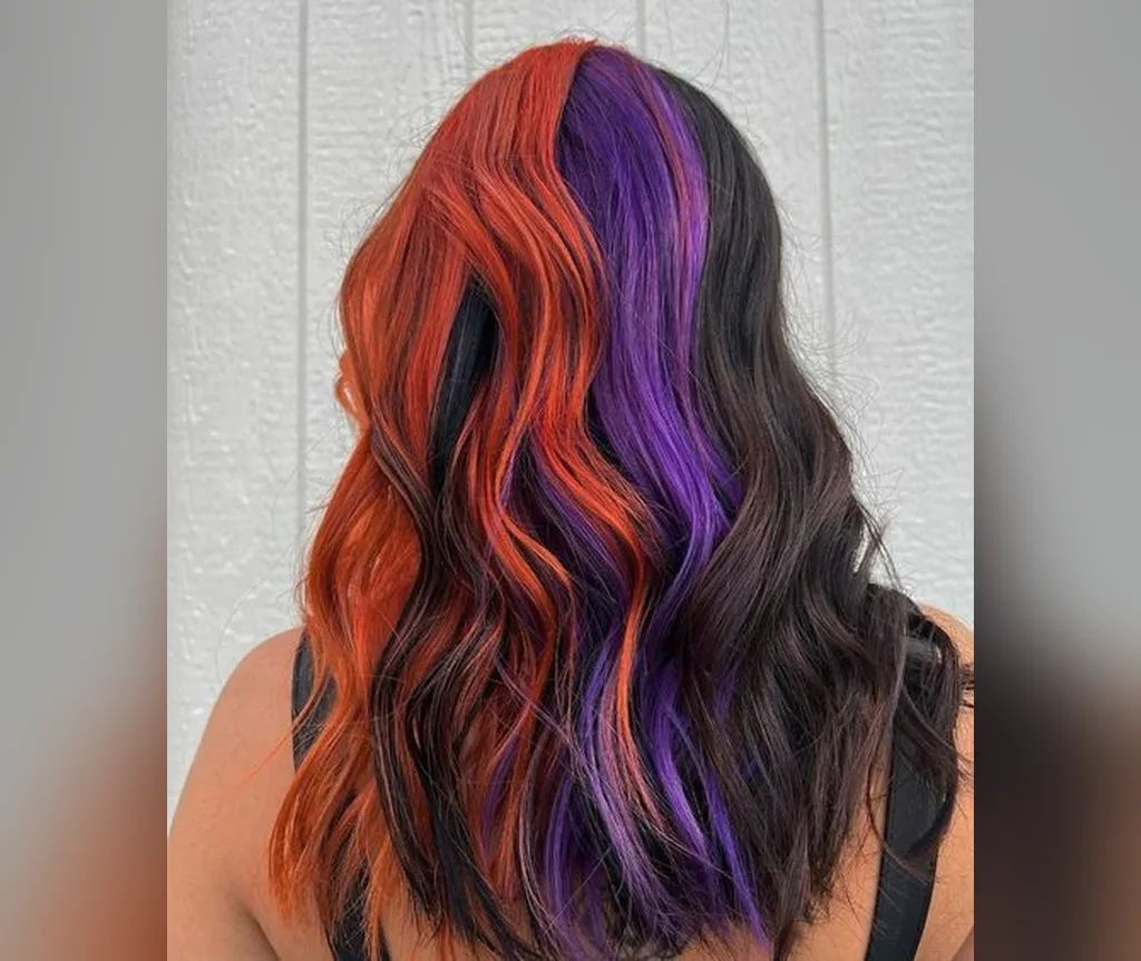 Orange purple and black waves in halloween hair color ideas