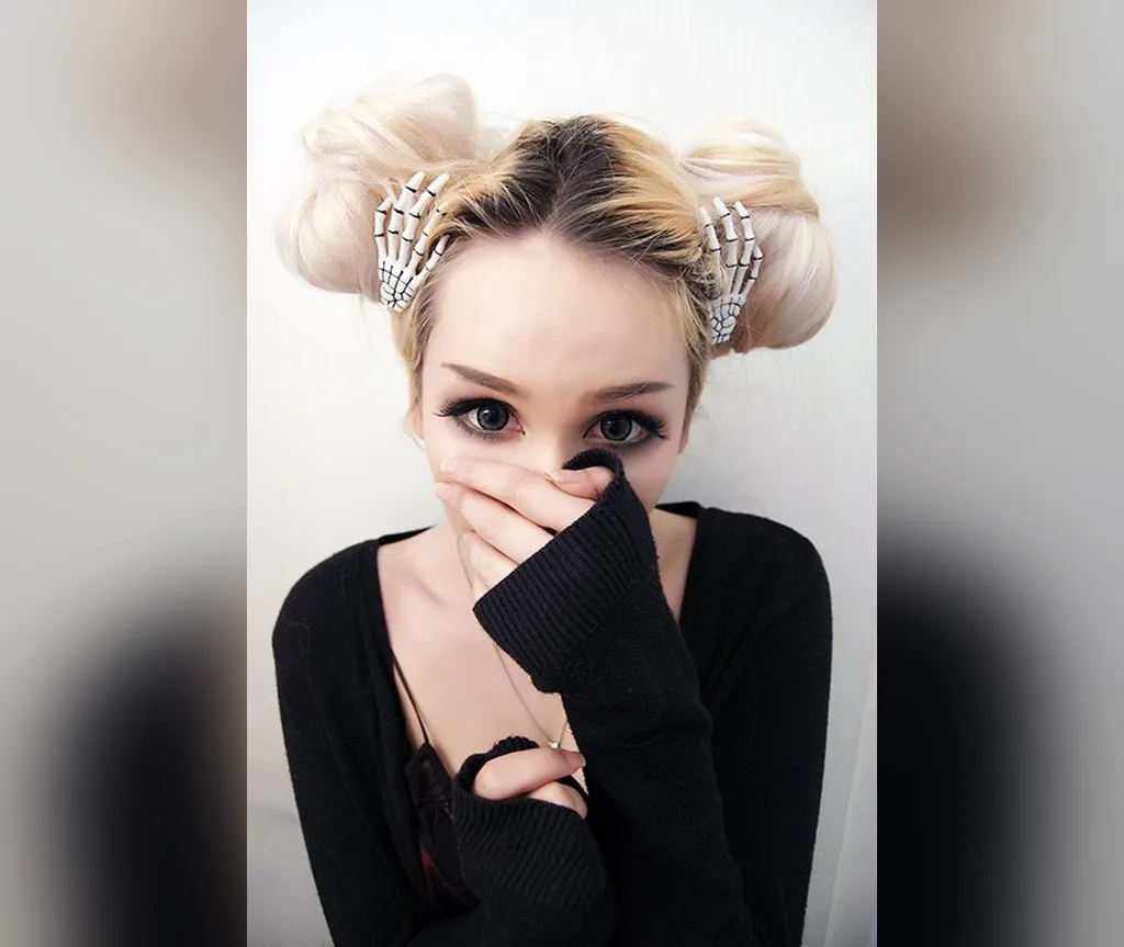Platinum space buns with printed ribbon detail, cute and easy halloween hairstyle