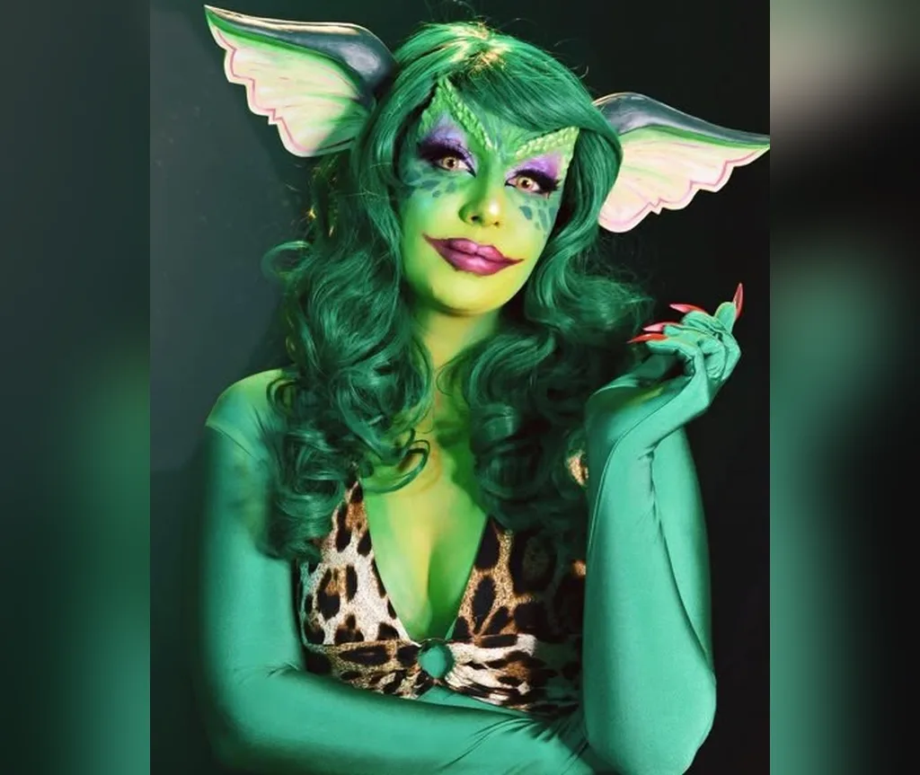 Green goblin curls with pointed elf ears, fantasy halloween hairstyles for women for woodland creatures