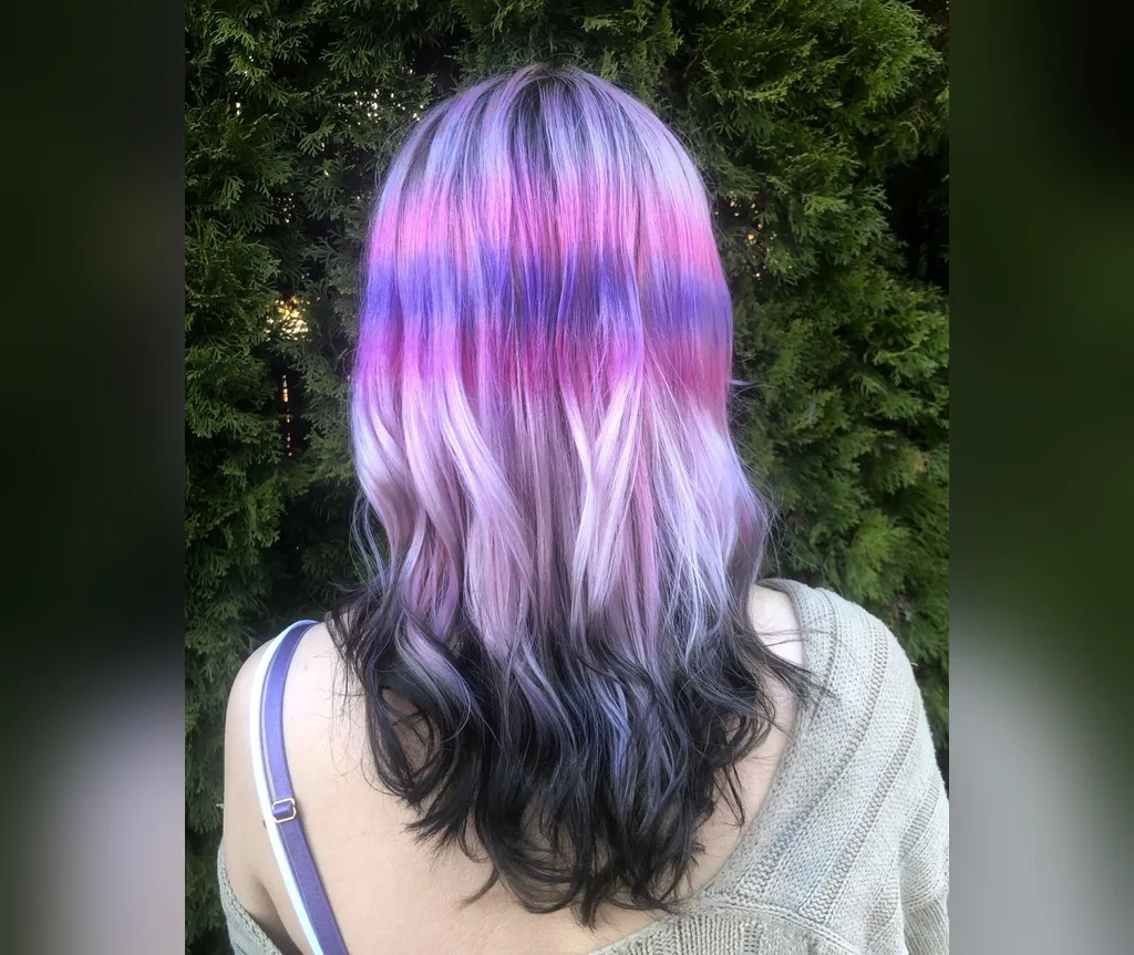 Pastel purple pink hair with black ends in halloween hair color ideas