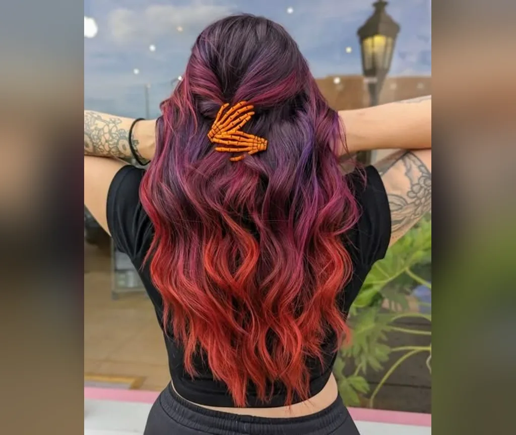 Burgundy purple waves with a skeleton clip in halloween hair color ideas
