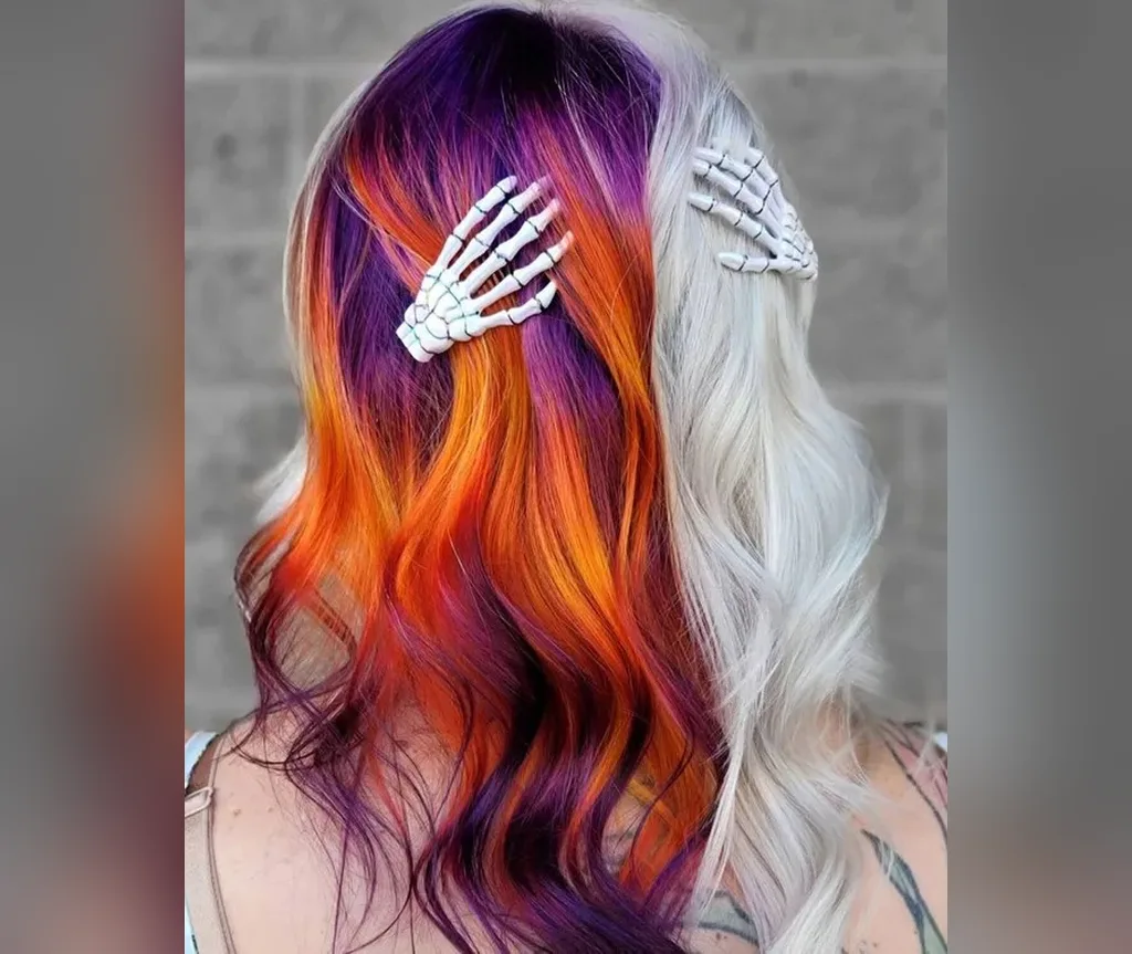 Sunset split dye with white panels and skeleton clips in halloween hair color ideas
