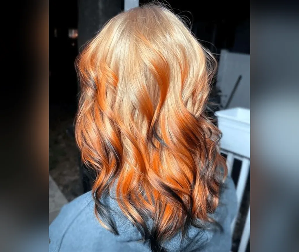 Calico orange and black ends on blonde hair in halloween hair color ideas