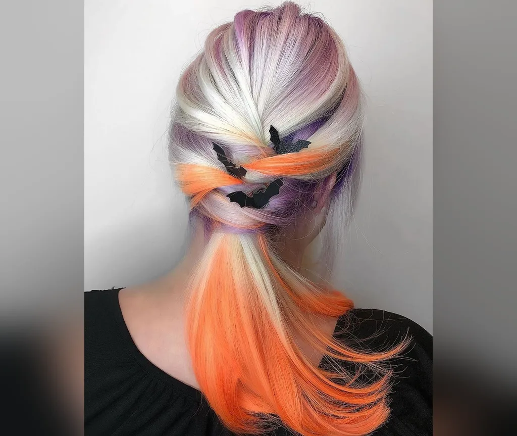 Pastel ponytail with orange ends in halloween hair color ideas