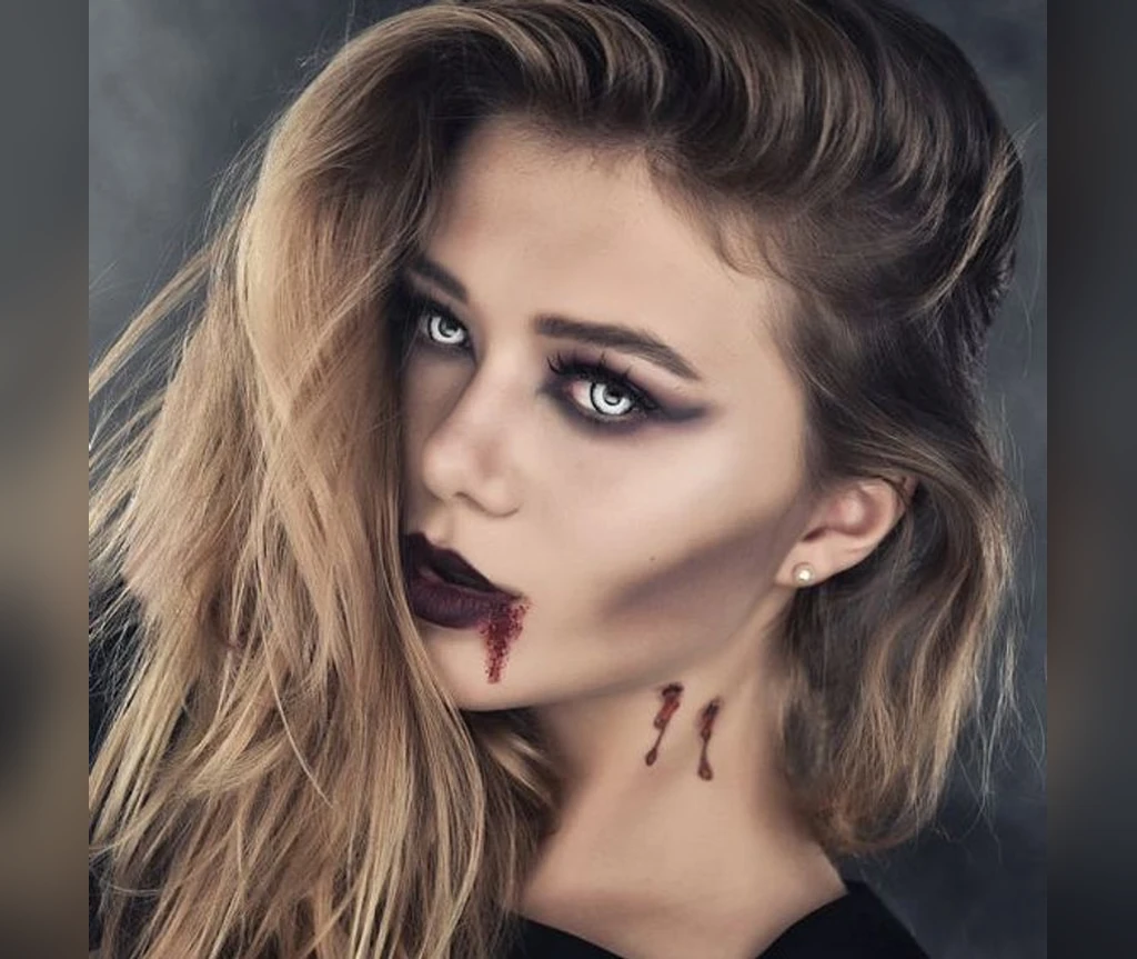 Blonde vampire hair with dark lips