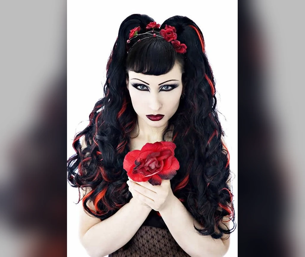 Gothic pigtails with red streaks and a rose