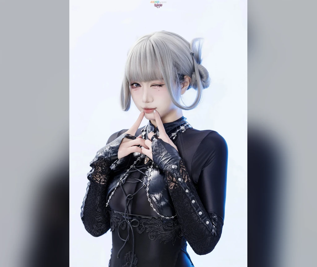 Silver space buns with a futuristic gothic style