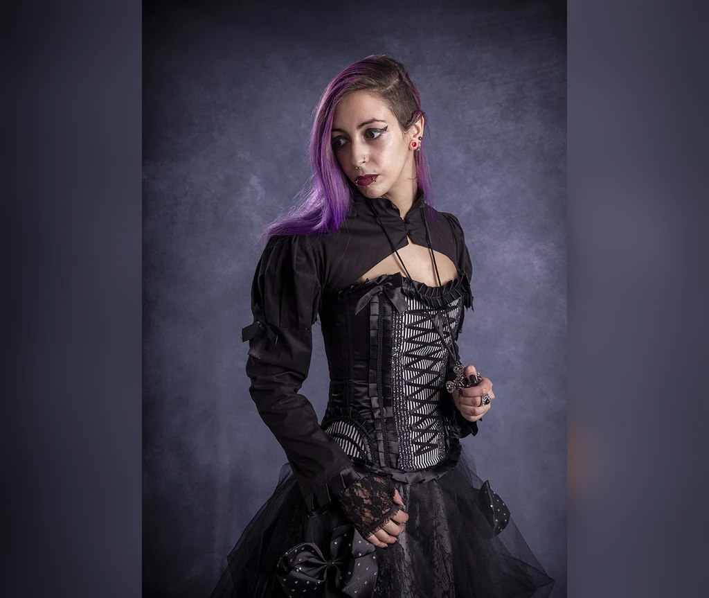 Shaved side with purple lengths and a corset