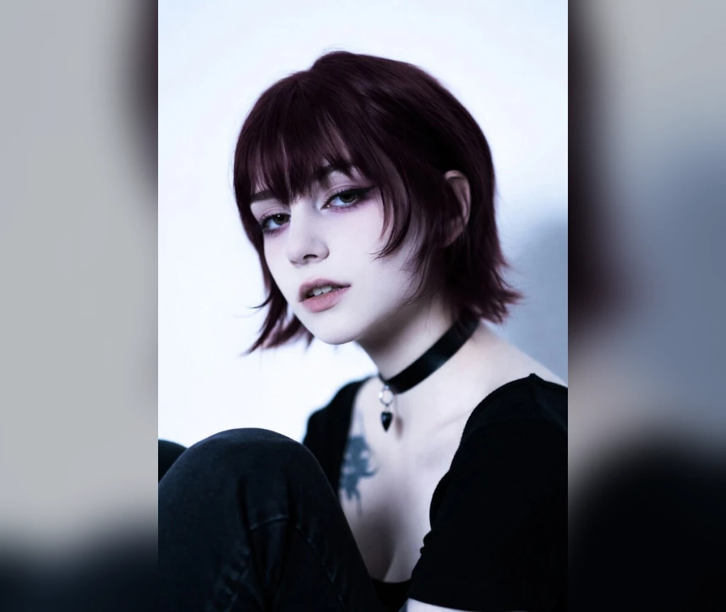 Burgundy bob with bangs and a choker
