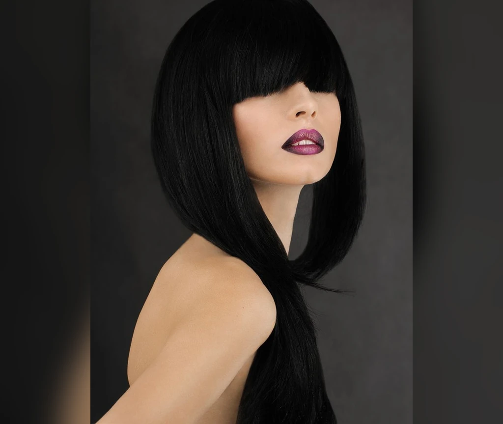 Sleek blunt vampire cut with heavy bangs