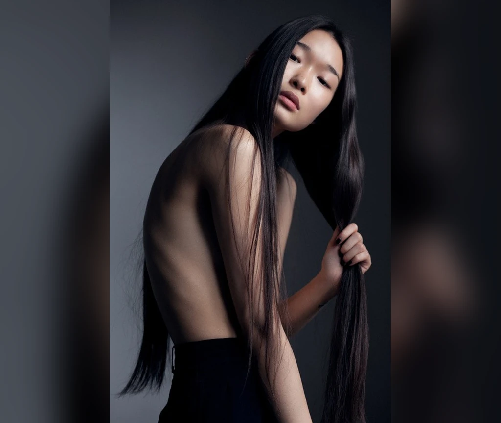 Tousled dark vampire hair with natural texture