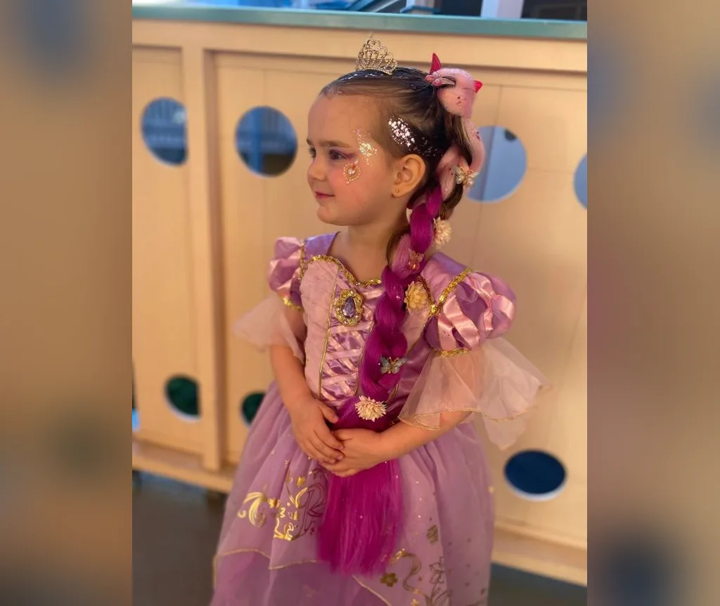 Long pink princess braid with a fairytale finish, halloween hairstyles for girls