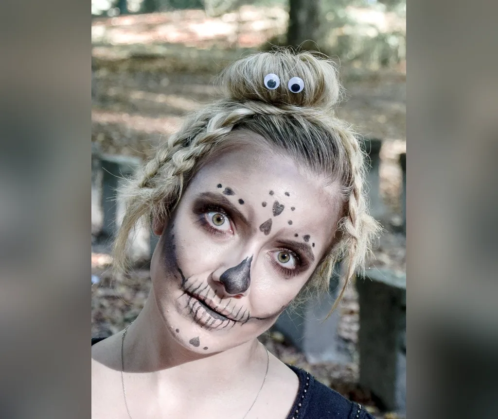 Top bun with googly eyes and skeleton face paint, funny easy halloween hairstyle