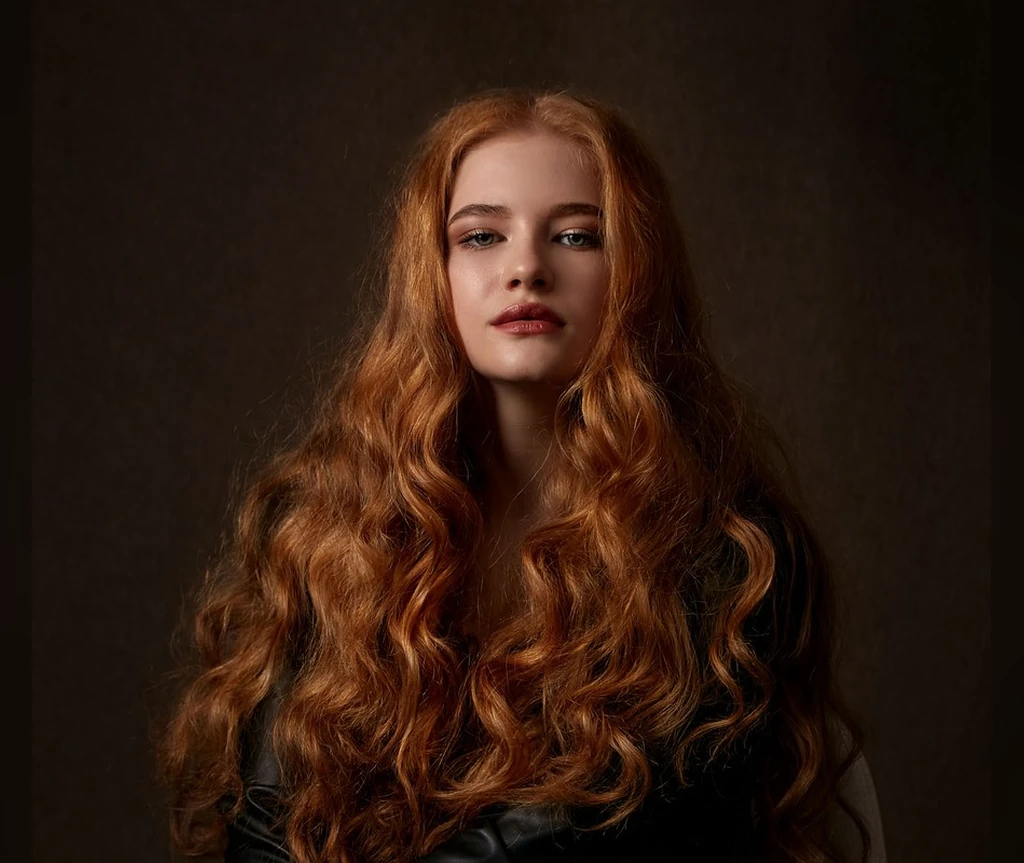 Golden copper waves on very long hair