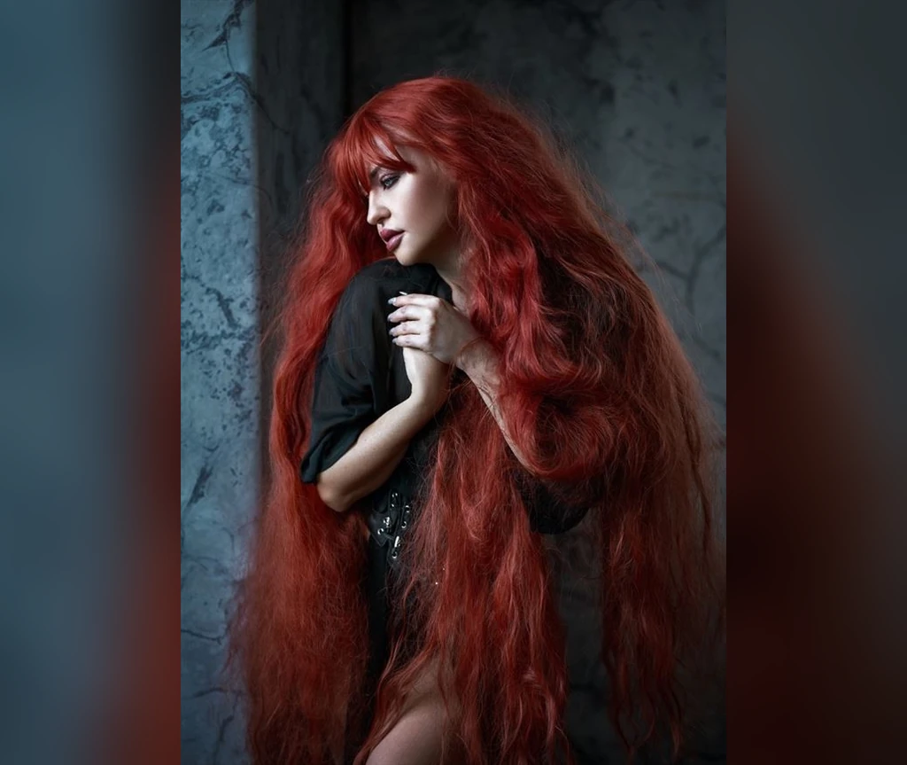 Extreme red length flowing past the waist