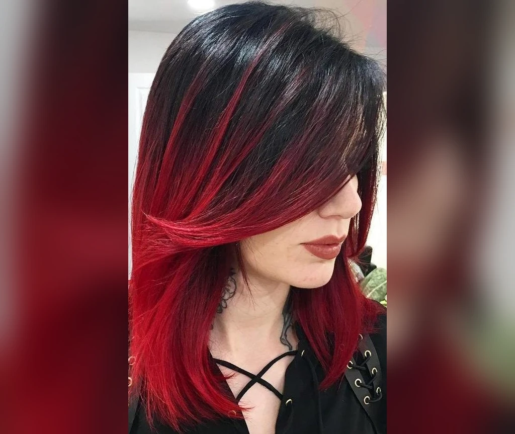 Red-tipped dark lob with a side sweep