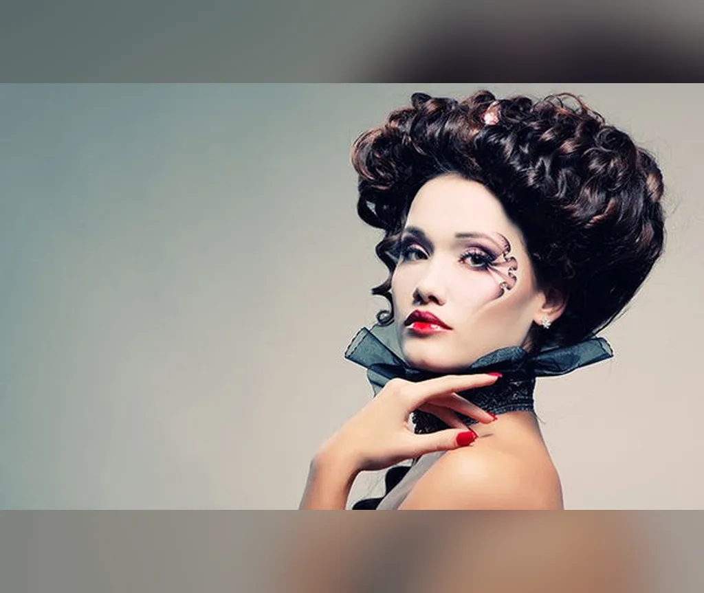 Dark sculpted curly updo fit for the Queen of Hearts, royal villain halloween hairstyles for women