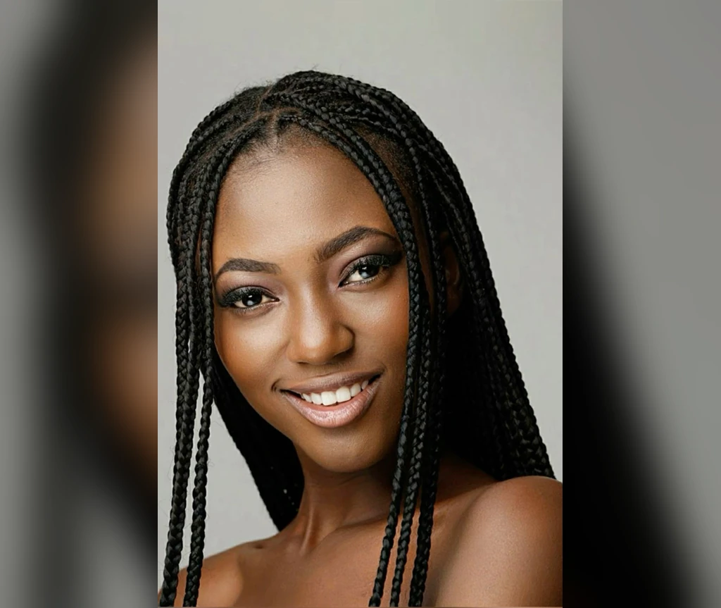 Ghanaian braids hairstyles - smiling woman with neat Ghana braids
