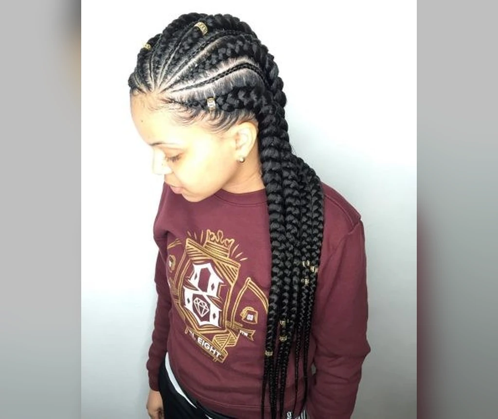 Ghana braids with a middle part and symmetrical long rows