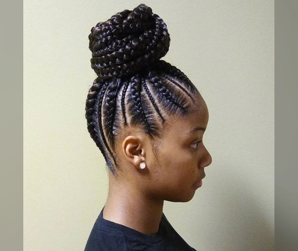 Ghana braids with a crown bun piled high on the head