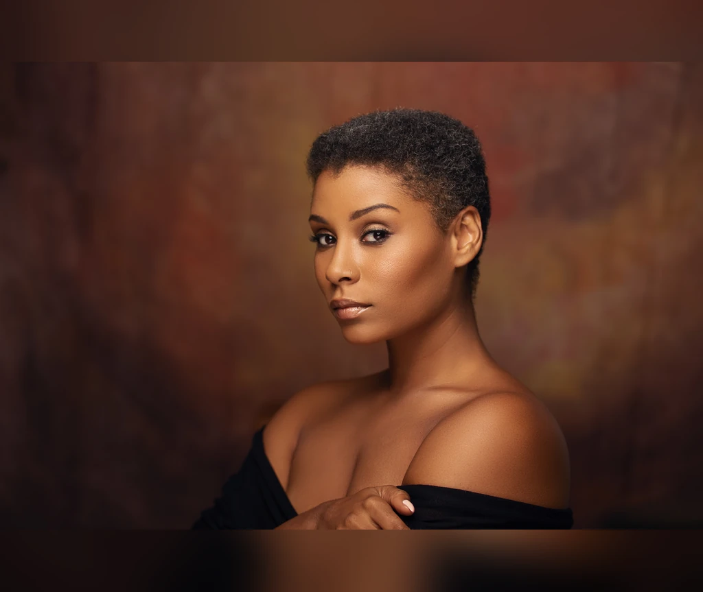 Elegant short crop on a Black woman in a studio portrait