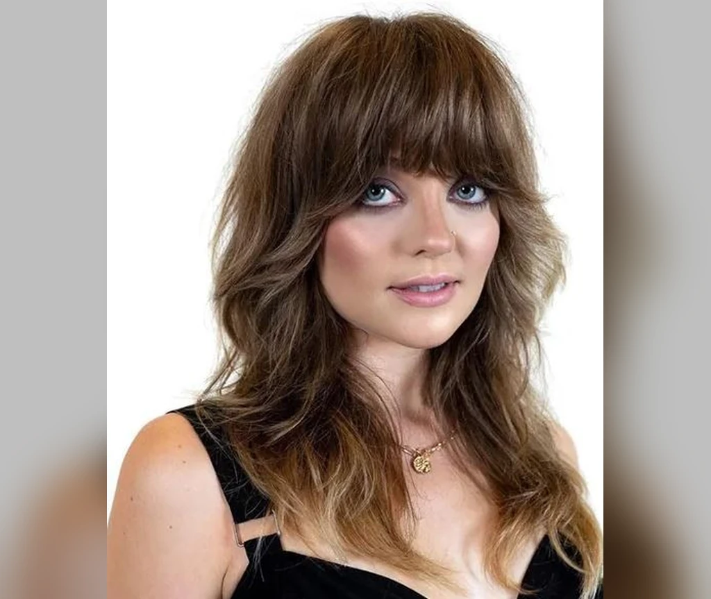 Brunette shag with balayage highlights and long shaggy layers