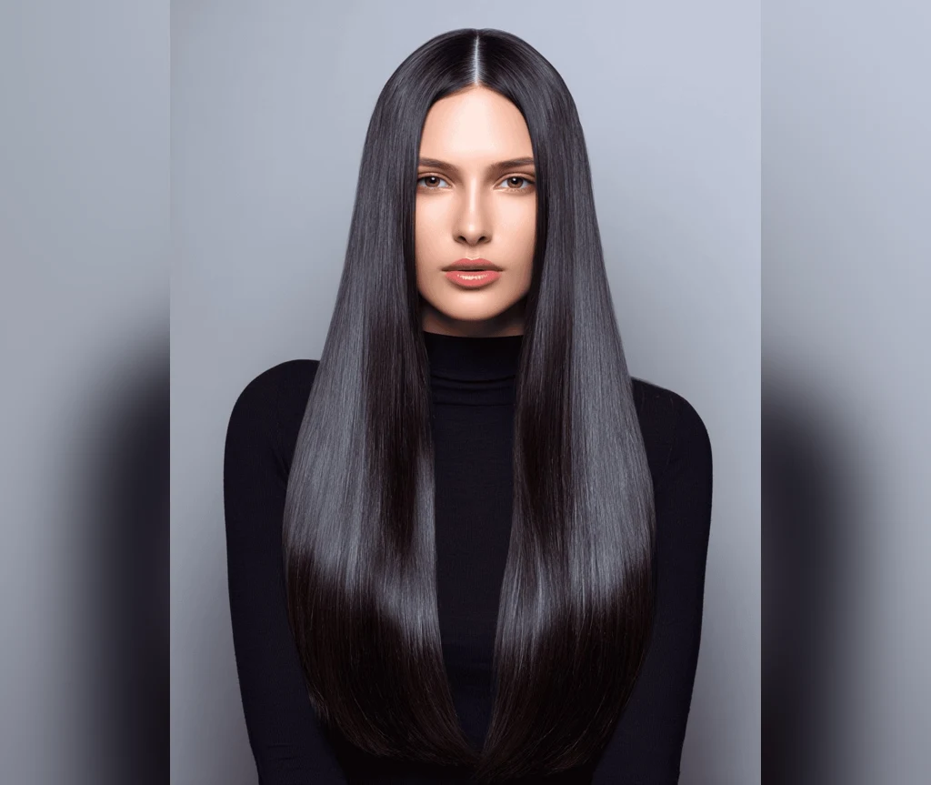 Liquid dark vampire hair with a widow's peak hairline