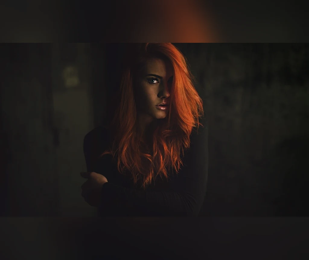 Crimson hair glowing in the dark