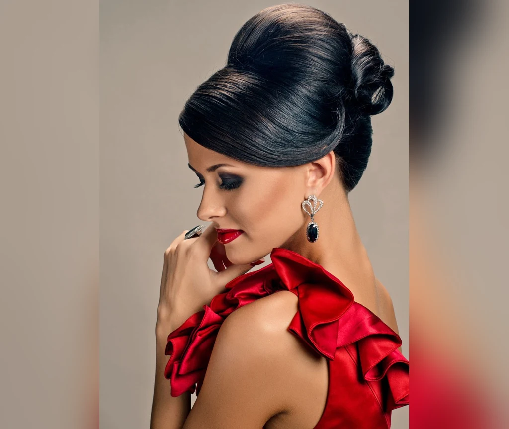 Sleek dark updo with deep red lips