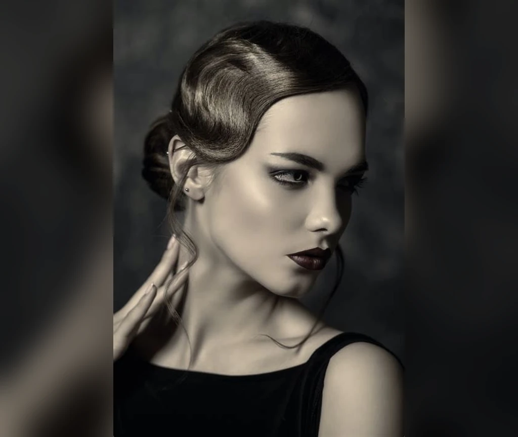 Slicked vintage vampire waves with a retro finish