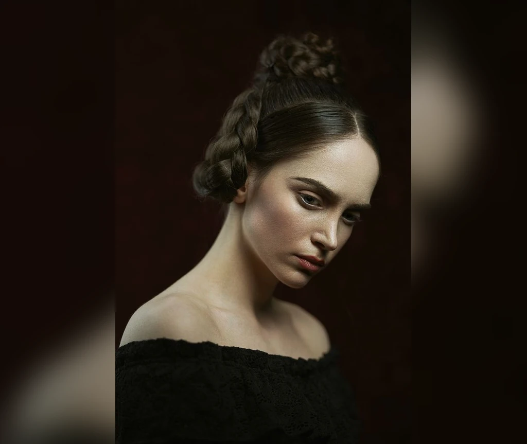 Braided bun updo with a woven crown finish