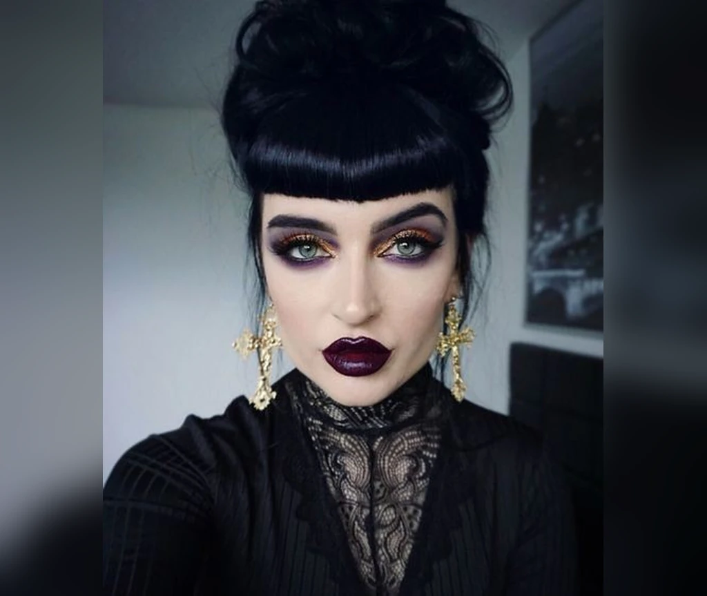 Gothic beehive updo with bangs and lace